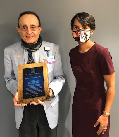 Dr Chhatwal presents the Arizona Psychiatric Society Career Achievement in Psychiatry Award to Dr Racy in Oct 2020.