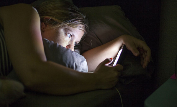 More time spent looking at screens can lead to trouble sleeping at night. Getty Images