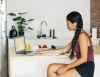 A woman working from home. A woman working from home.