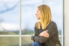 Woman looks out window. METRO CREATIVE GRAPHICS Woman looks out window. METRO CREATIVE GRAPHICS